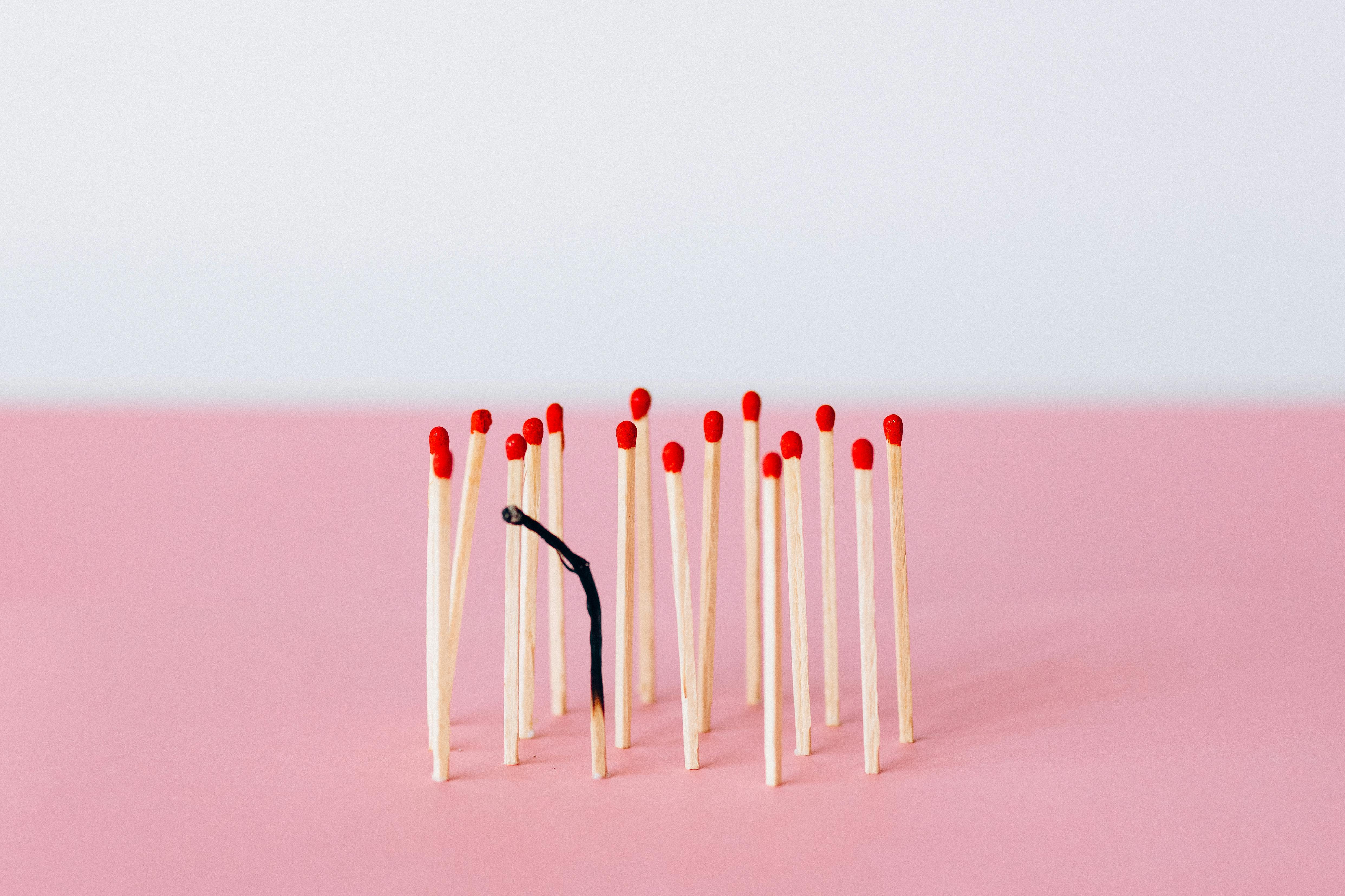 matchsticks-on-pink-surface