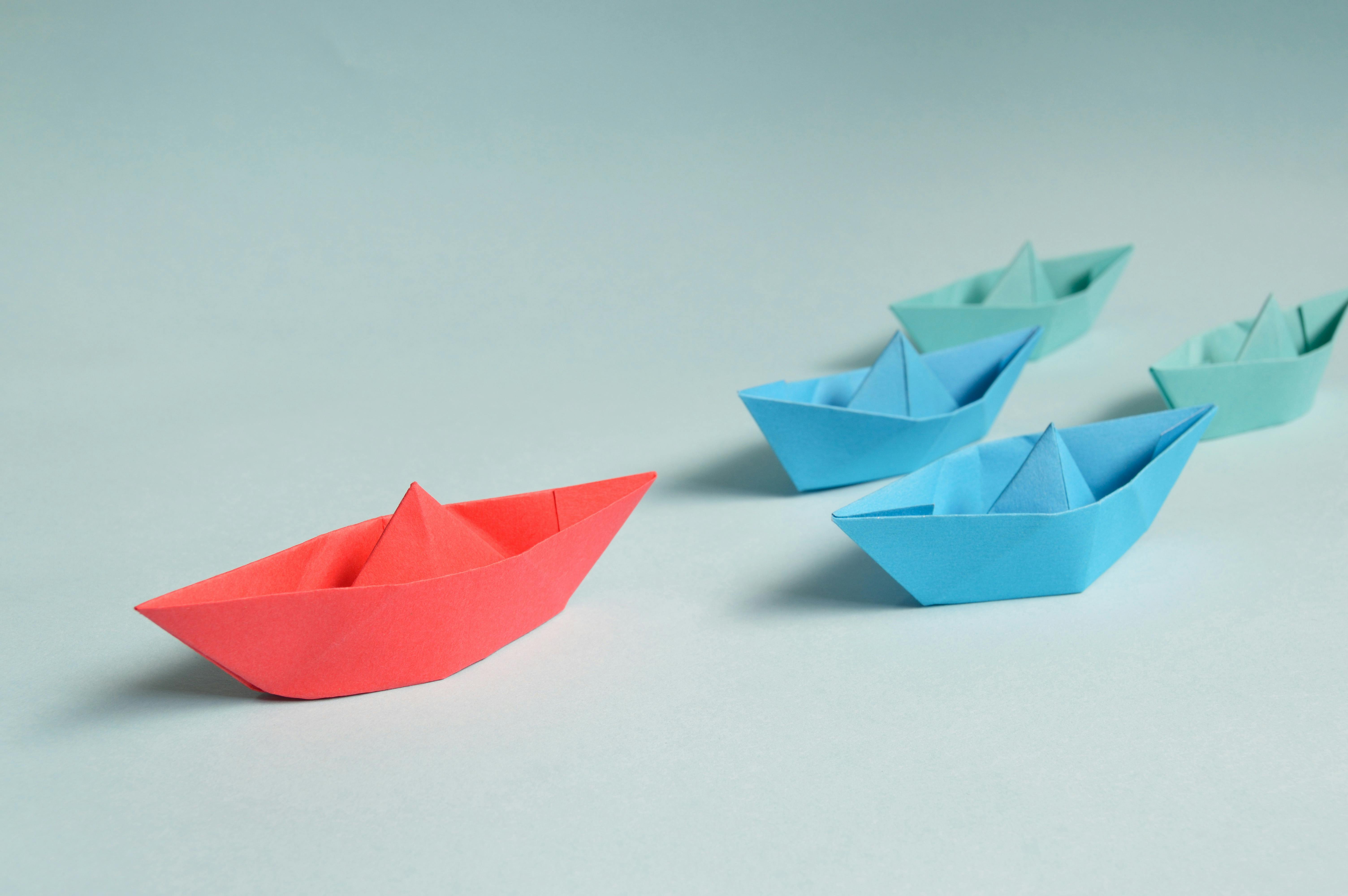 paper-boats-on-solid-surface