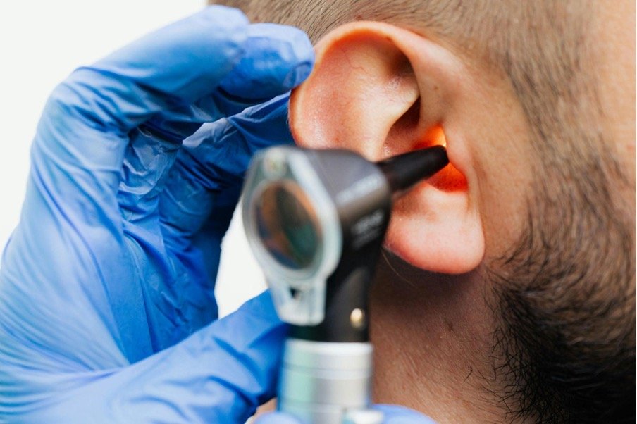 a patient having an ear examination