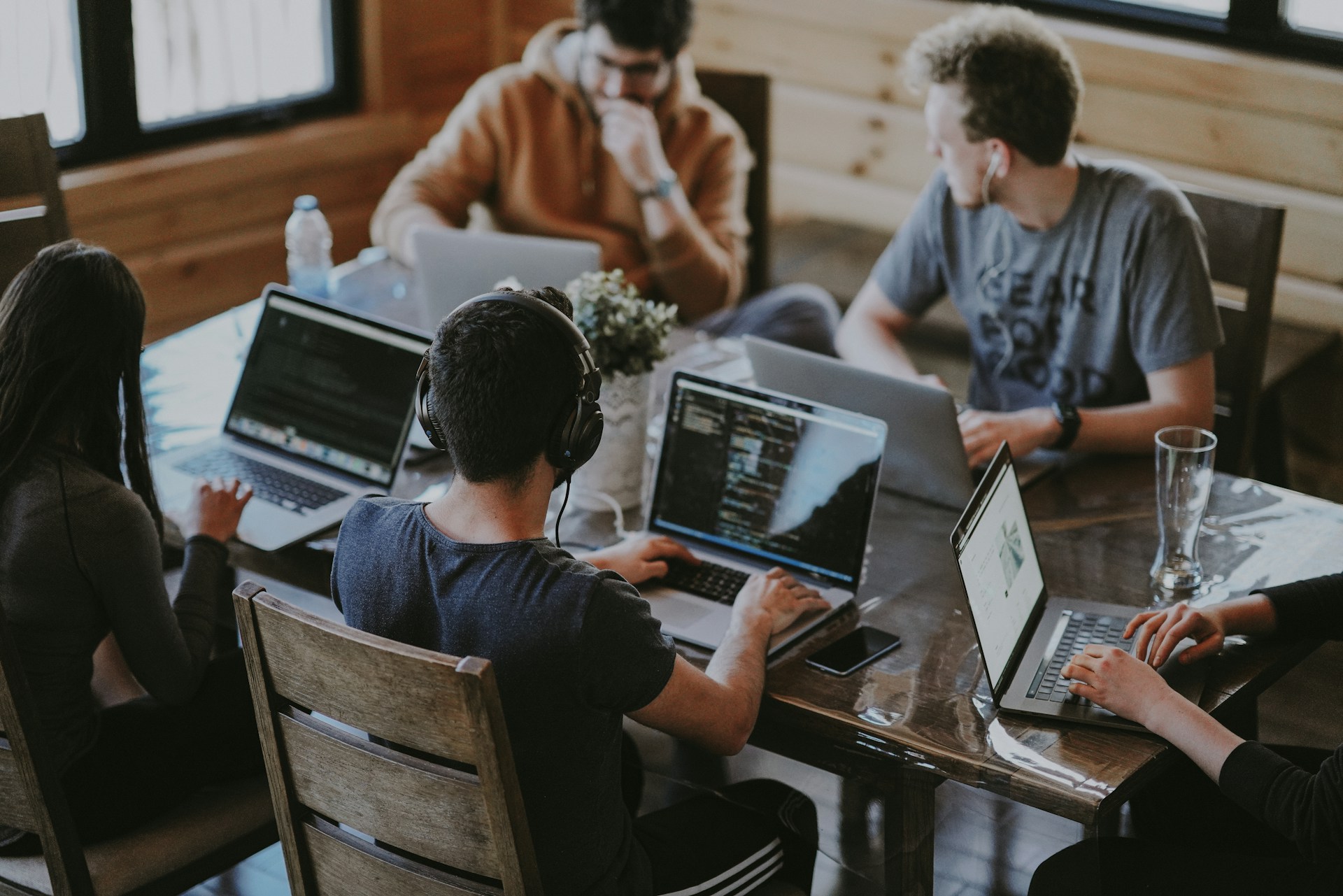 group of people around computers